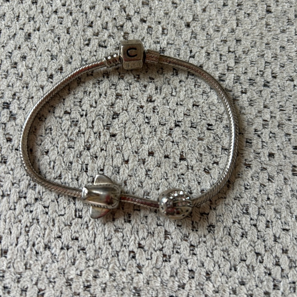 Authentic Camilia bracelet with 2 charms